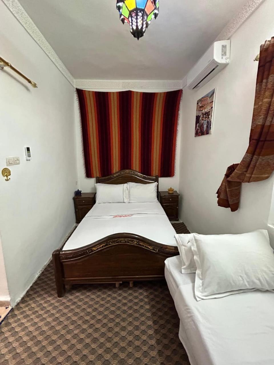 Quarto em Acomodações Particulares Darmouniafes *